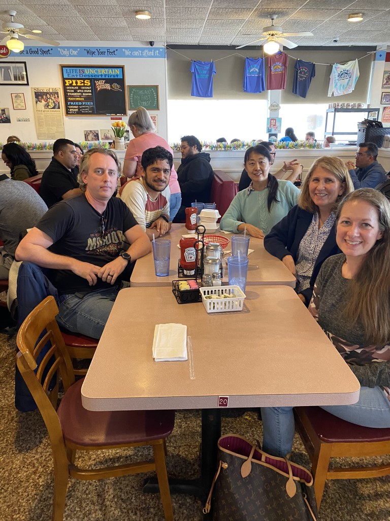 A group of people at lunch at a restaurant